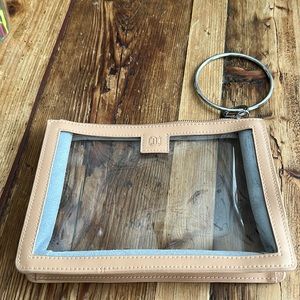 Big O Clear Bracelet Bag w/natural trim. 5.75” x 8.75”